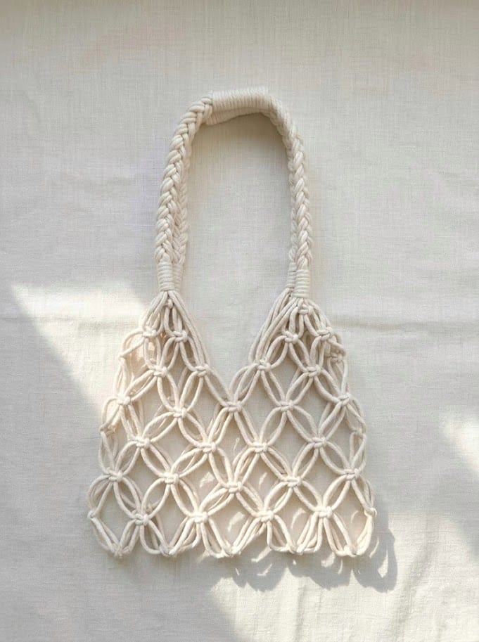 handmade macrame net bag with open weave cotton design in boho style